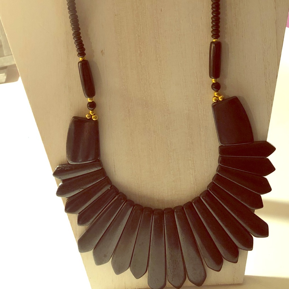 African black stoned necklace .